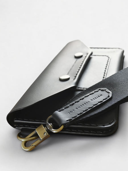 Clutch Crosbody Umhaengetasche aus Echtleder mit Handgurt handgenaeht