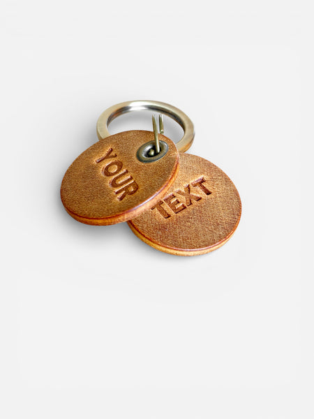 Schuesselanhaenger Leder Farbe Cognac mit deinem text personalisierbar
