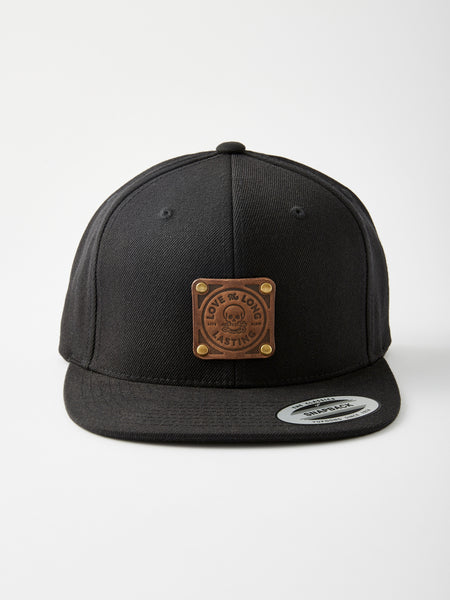 Snapback-Cap schwarz 6-panel-cap mit dunkelbraunem Lederpatch